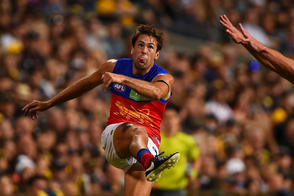 AFL 2016 Rd 01 - West Coast v Brisbane PERTH, AUSTRALIA - MARCH 27: Marco Paparone of the Lions kicks during the 2016 AFL Round 01 match between the West Coast Eagles and the Brisbane Lions at Domain Stadium, Perth on March 27, 2016. (Photo by Daniel Carson/AFL Media)